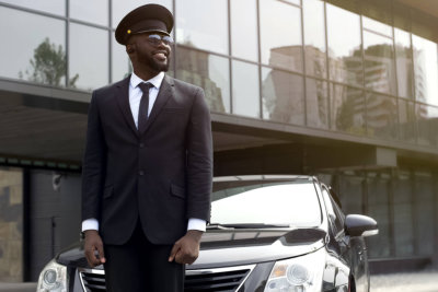 man with a car on the background